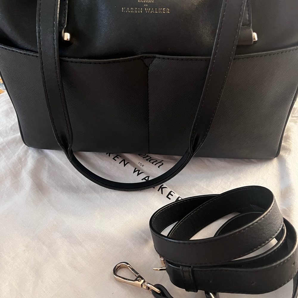 Benha KAREN WALKER leather duffle. If I remember correctly it’s the doctor bag.